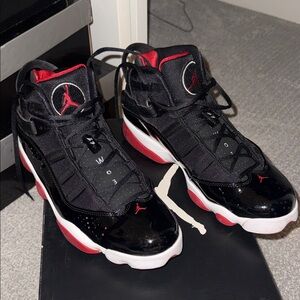 Jordan 6 Rings in Black and Varsity Red